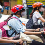 Young people wearing mask due to air pollution